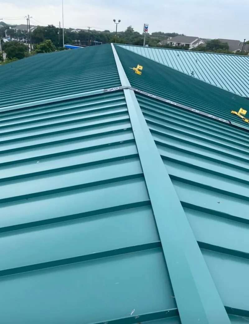 Green commercial metal roof ridge and valley for Metal Roof Repair in Heathrow